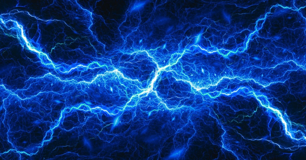 A mass of glowing blue lightning and plasma energy crisscrossing over each other against a black background.