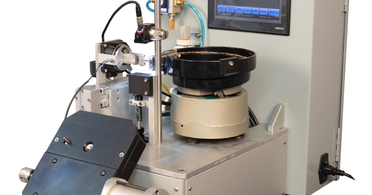 A comprehensive view of the Tri-Star Technologies TAC-ULTRA automatic crimping machine against a white background.
