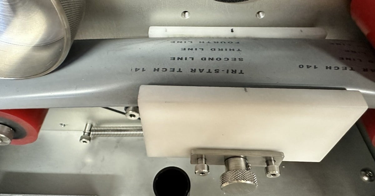 A close-up of the interior tube of the Tri-Star Technologies in-line laser marker, the M100L-FG-TT-METEOR.
